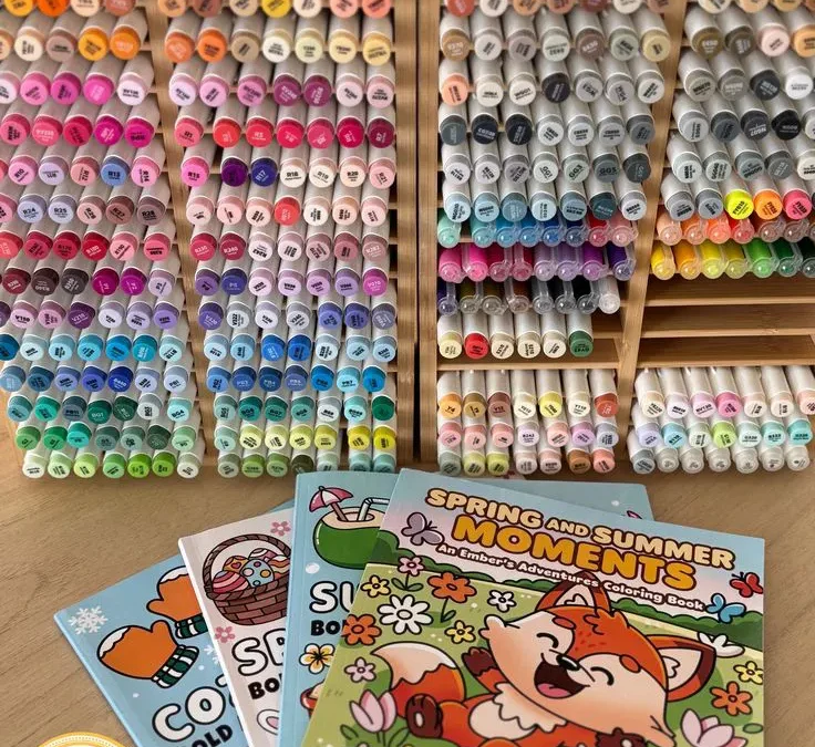 Sticker & Shade adult coloring books displayed with a colorful marker collection for beginner coloring inspiration.